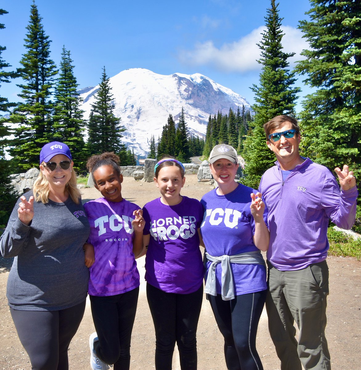 TCU's tweet photo. Two Horned Frog families taking on @MountRainierNPS and cooler temperatures! #MyTCUsummer #GoFrogs https://t.co/7YbLSwjWSK