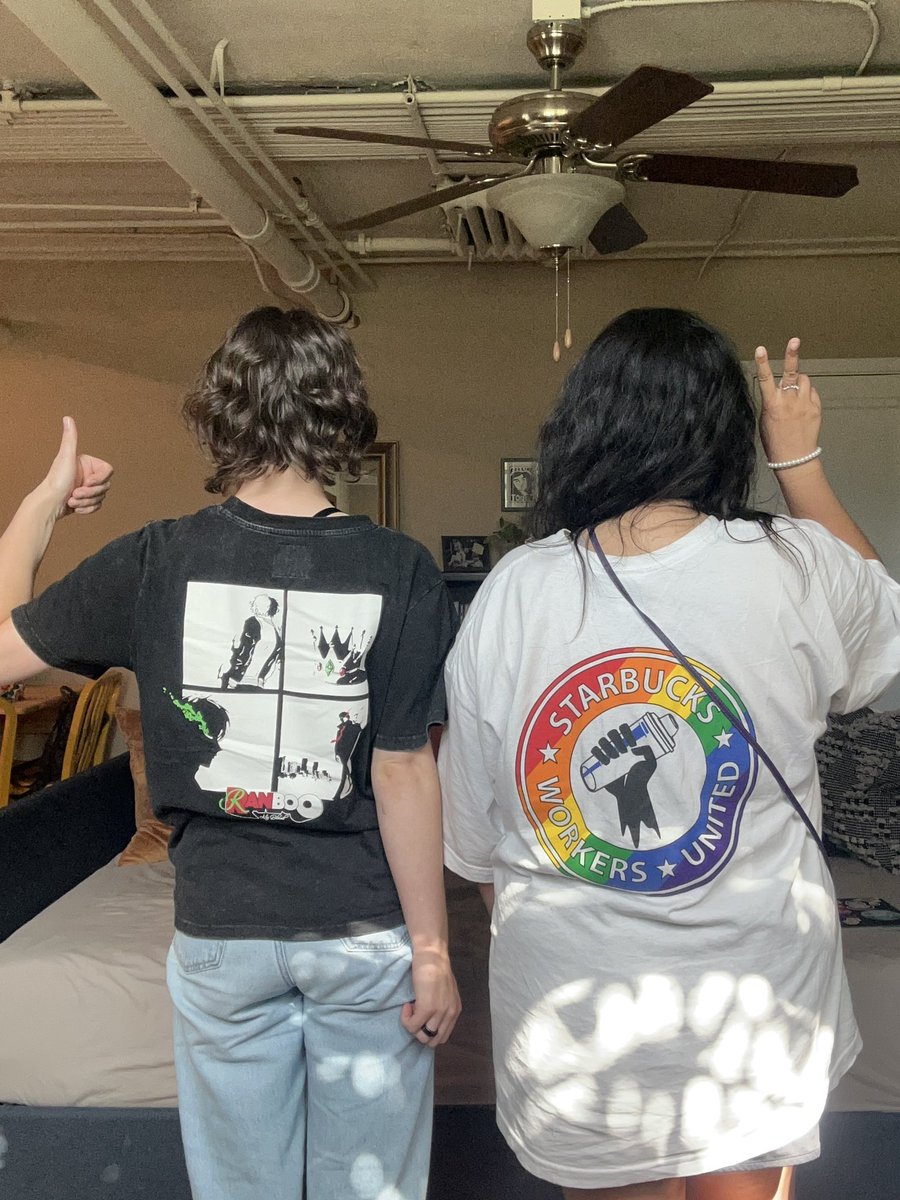 laborchelita's tweet photo. guess which graphic t-shirt got dress coded at the shift supervisor meeting today (neither of us worked on the floor). union t-shirts are protected under the NLRA, but Starbucks says they’re a ‘special circumstance’ https://t.co/2GL9aaOQT2