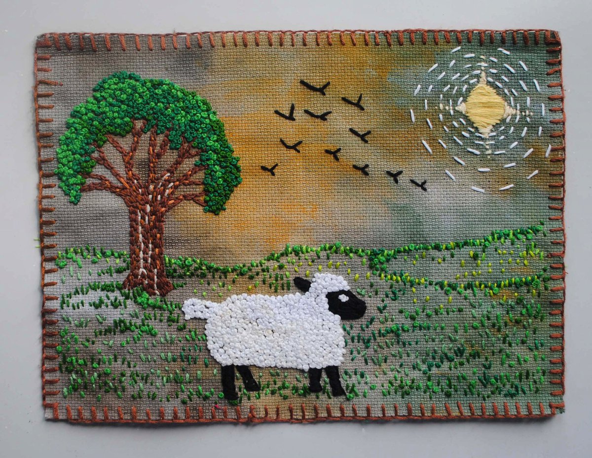 One of my favourite pieces of stitching; An embroidered sheep in a field on painted cross-stitch fabric. 

.. 

#sheepembroidery #slowstitching #handstitched #landscapeembroidery #texturedart #embroideredpicture  #frenchknots #treeembroidery #sheepinafield #paintingonfabric