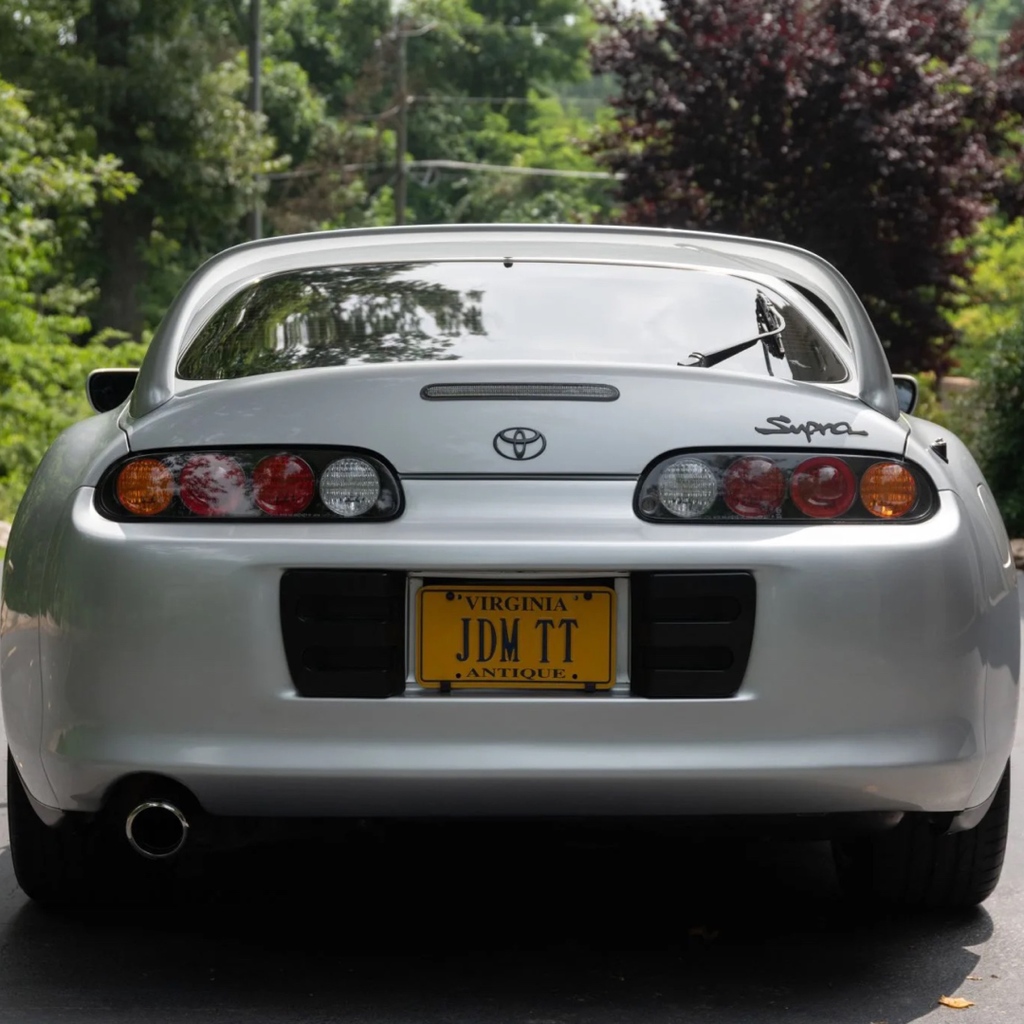Bringatrailer's tweet photo. Silver slicktop Supra

This 1993 Toyota Supra RZ is a JDM import. Finished in Alpine Silver over black cloth and vinyl, the car is powered by a twin-turbo 3.0L 2JZ I6 linked with a 6-spd manual and an LSD. Showing ~73k miles, it’s listed now on BaT:
https://t.co/IwHmbysVCG https://t.co/Cp4OPc9co5