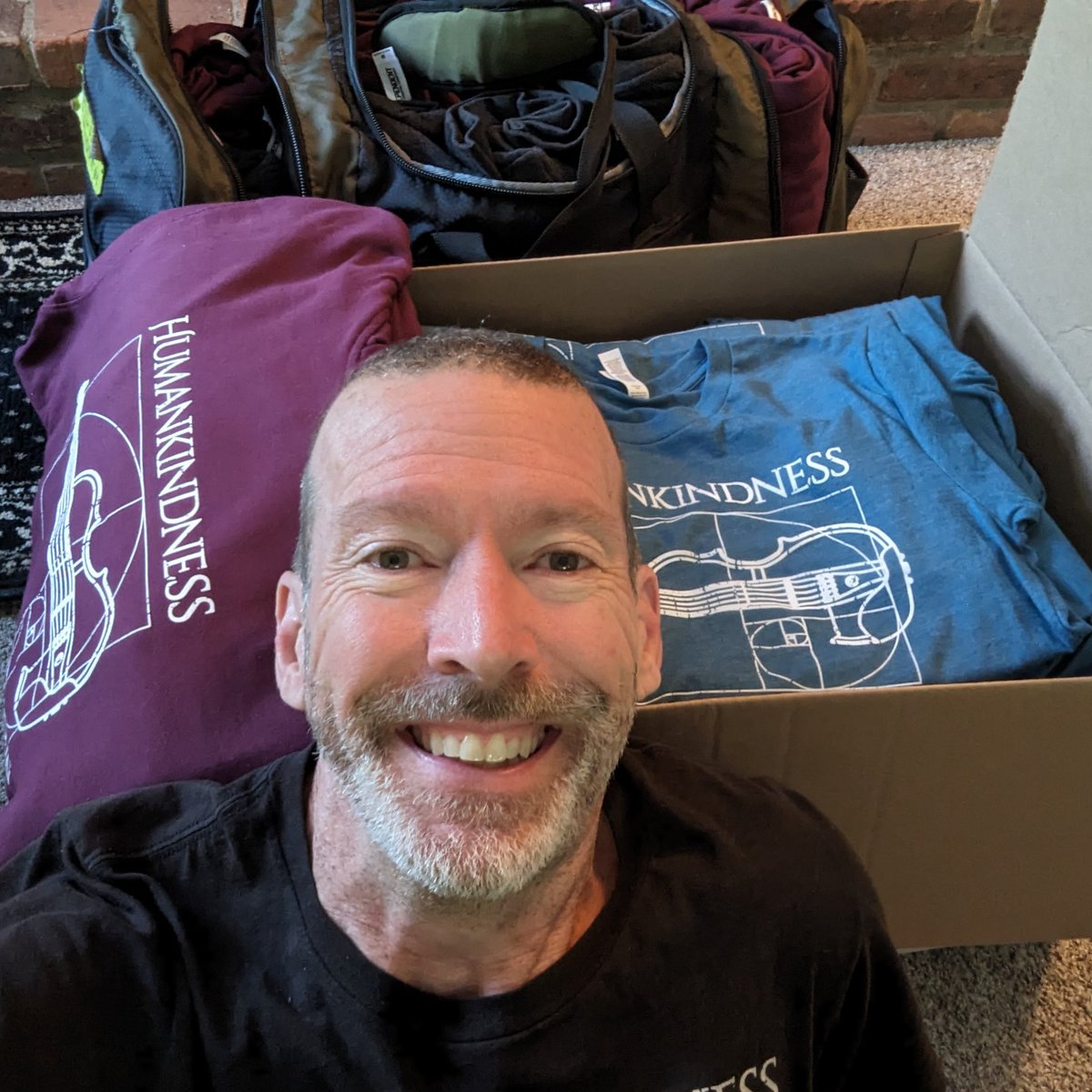 What I'm doing: restocking, folding and sorting T-shirts and hoodies - getting ready for 3 shows this week: tonight in Big Rapids, Friday in Auburn Hills, and Saturday at the Legacy Michigan festival in Hartford, MI 💖!🙏 (my #Humankindnesstour details: dixonsviolin.com)
