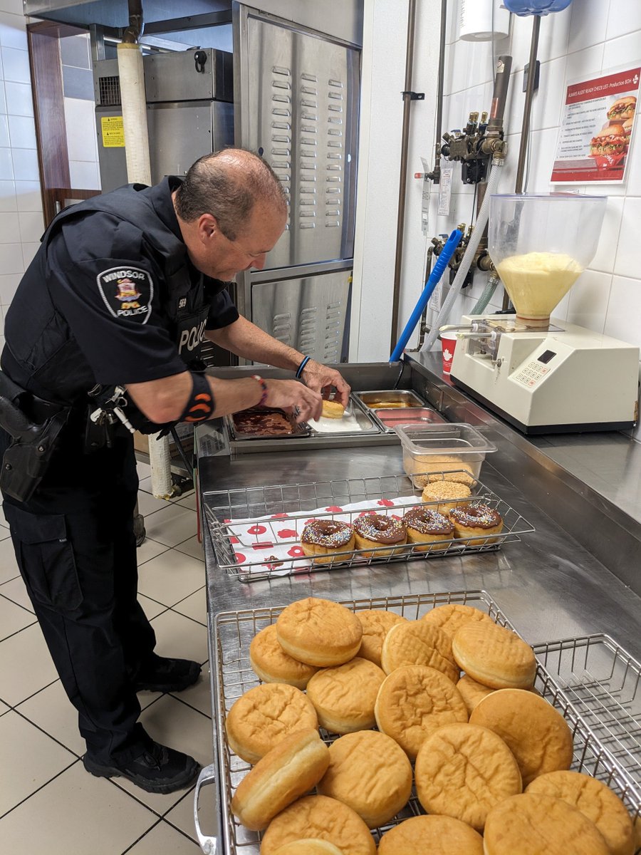 wpsSean's tweet photo. @WindsorPolice having fun helping out at local @TimHortons for #CampDay https://t.co/9atcNKXga8