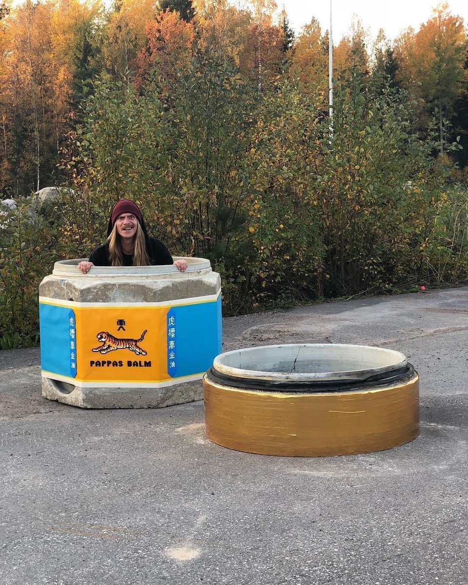 “Someone” painted the cement barriers into a giant Tiger Balm.
