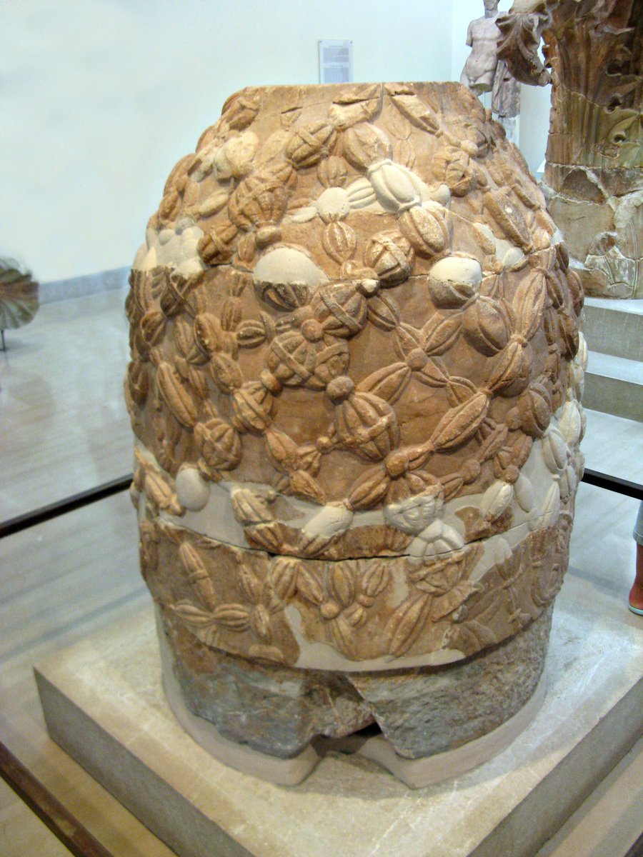 LiddellAndScott's tweet photo. ὀμφαλός, ὁ (omphalos)
—navel
—anything like a navel, e.g. knob or boss or button 
—centre or middle point; later Delphi (or rather a round stone in the Delphic temple) was called ὀ. as marking the middle point of Earth, 

[The omphalos in the museum of Delphi] https://t.co/oMiTr3Ybem