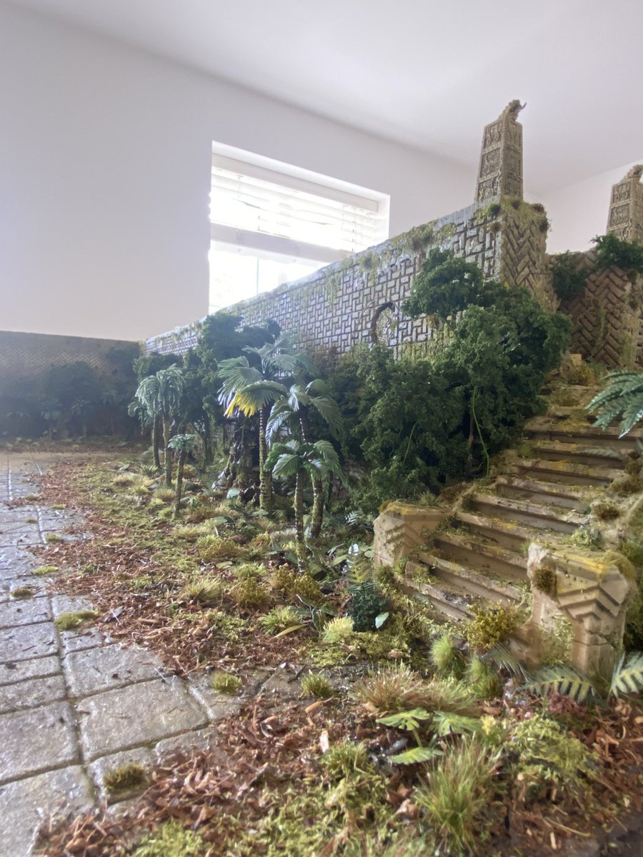 TJBrown89's tweet photo. My Lustria-themed temple-city board. It is 6’ x 4’ and based on a ruined temple-city inhabited by a small host of Lizardmen under the direction of their slann mage-lords. It was quite difficult to photograph but I’ll keep trying to get some better shots. @warhammer https://t.co/2JGkOP9l0a