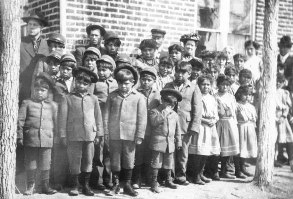 In the 1900s, the Panguitch Boarding School in Utah was one of many Native American boarding schools aiming to assimilate Indigenous children. A photograph captured a group of Native American schoolchildren at the school, symbolizing the painful history of forced assimilation.…