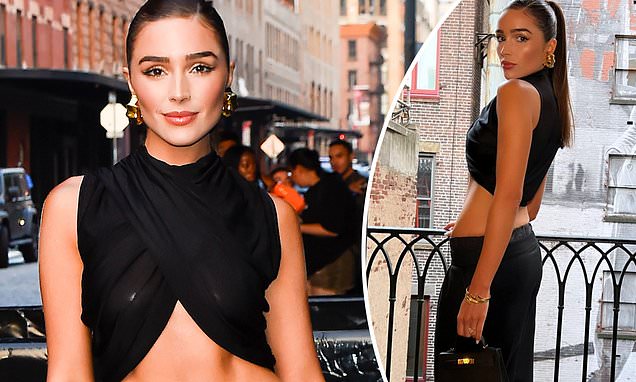 Olivia Culpo showcases her taut tummy in black crop top and low-slung trousers... one week after hosting her engagement party with fiance Christian McCaffrey in Rhode Island https://t.co/HxWFe63XIF   https://t.co/13QjCxNTNz https://t.co/nTq6VVD2Mq