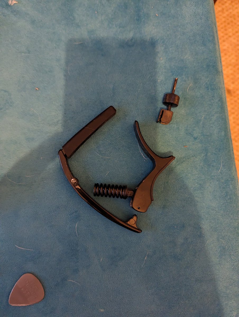 GentlemanBusker's tweet photo. Dear @DaddarioandCo after using your capo (and strings) for a very long time. It's finally happened I have snapped my capo. Ps I have shaped the pieces into a "d" hope you like #whydoialwaysbreakmusicequipment https://t.co/AdgLQiOmdQ