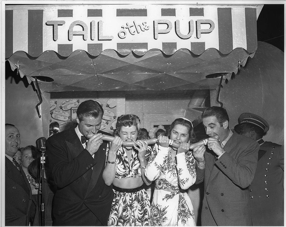 Happy National Hot Dog Day, L.A.! From Pinks to the Pup, we love L.A.'s historic hot dog stands. 🌭❤️😋 #NationalHotDogDay #WienerWednesday . . . 📸: Tail o' the Pup in 1946, photo courtesy 1933 Group.