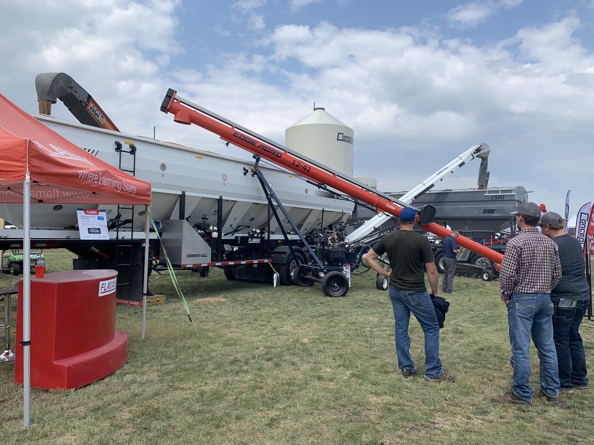 flamangroup's tweet photo. We are moving grain through an Edge Agro loading auger, ⁦@Convey_All⁩ CST-1550, ⁦@haulallind⁩ side draw seed tender, and ⁦⁦@AgGrowthIntl⁩ Batco UCX3 all day at ⁦⁦@AginMotion⁩! Visit us today and tomorrow to see these units in action. https://t.co/RkJ6ncJKSo