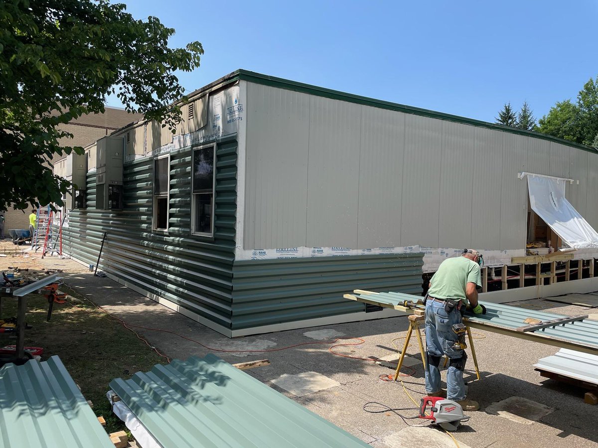 ChrisWoofter's tweet photo. #CFconstruct @DrJ_cfprincipal & @read_chagrin Solid progress continues on the Gurney - Early Learning Village Project - the metal siding is going on this week. The contractor is on target and progressing well with the construction. #cfevs https://t.co/98ZExEJqyZ