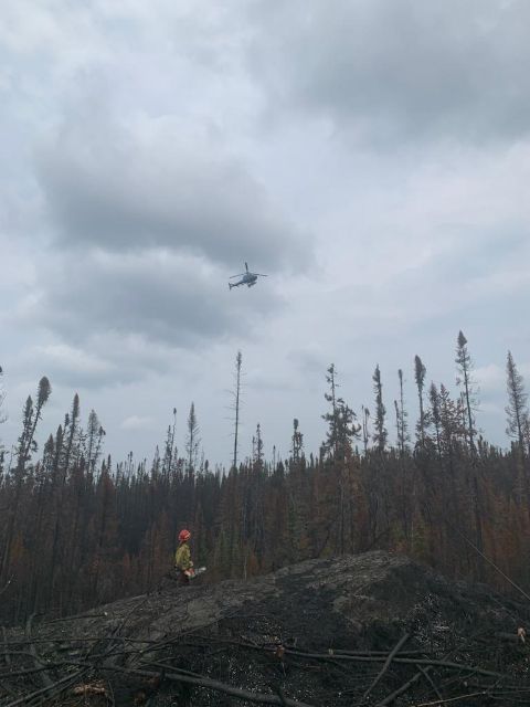 AOTVermont's tweet photo. While Vermont continues recovery work from flooding, our neighbors to the north are still fighting wildfires. AOT’s Kelsey Zaengle, a Maintenance Technician in District 3 Rutland who is a certified wildland/forest firefighter, is fighting the fires in Canada.  (Photos: MA DNR) https://t.co/Qgar9xYjps