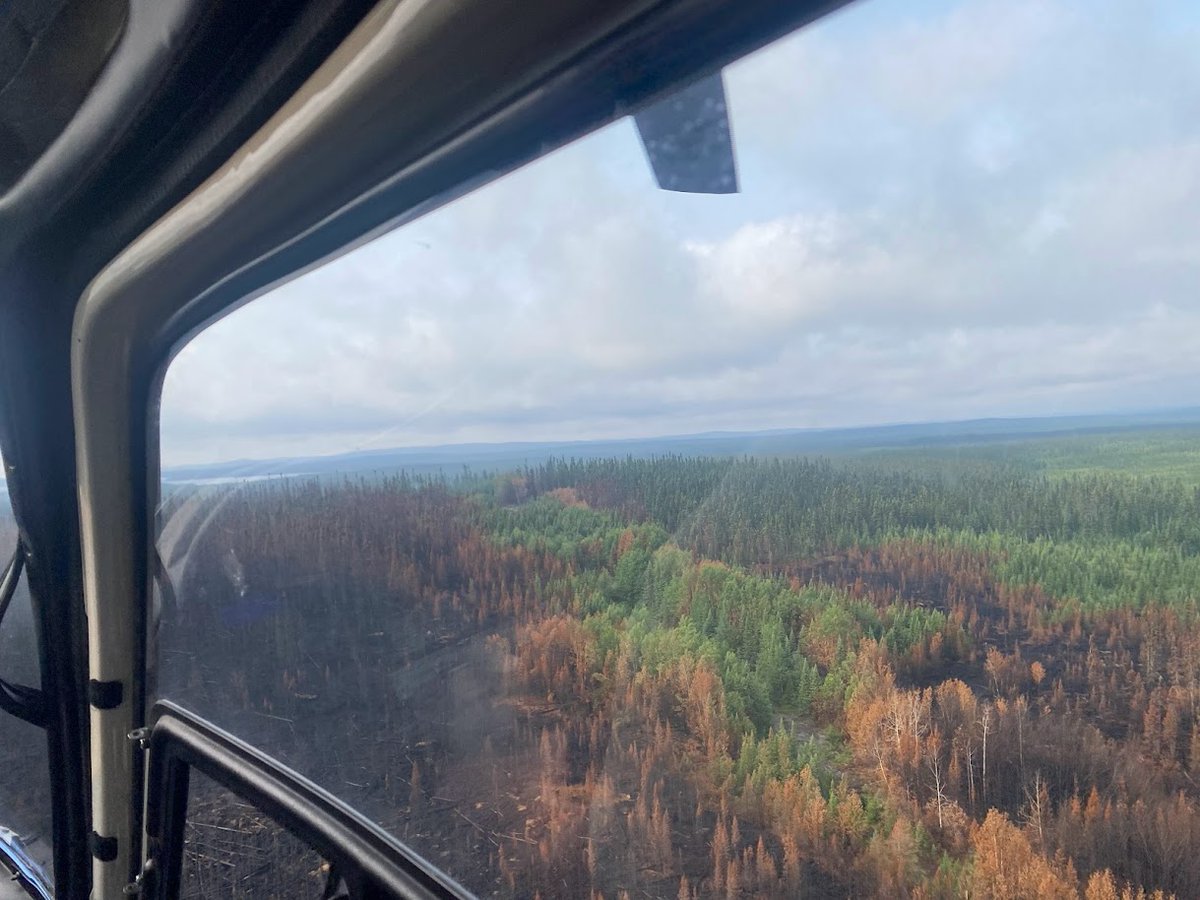 AOTVermont's tweet photo. While Vermont continues recovery work from flooding, our neighbors to the north are still fighting wildfires. AOT’s Kelsey Zaengle, a Maintenance Technician in District 3 Rutland who is a certified wildland/forest firefighter, is fighting the fires in Canada.  (Photos: MA DNR) https://t.co/Qgar9xYjps