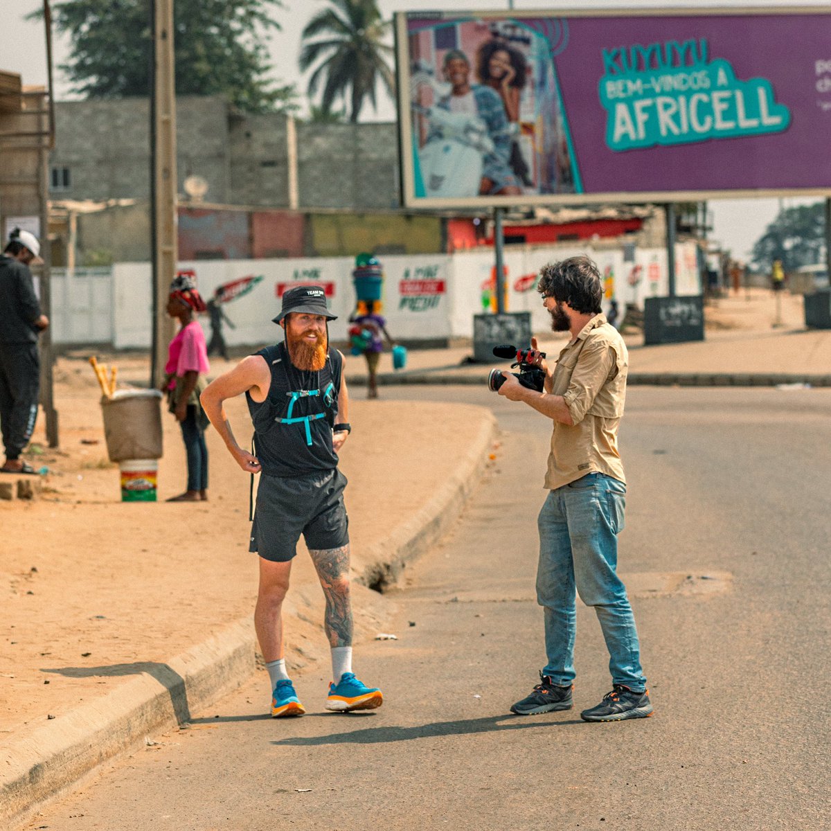 hardestgeezer's tweet photo. #ProjectAfrica Day 89: 31.5km

BACK ON ROAD. Hectic day. Maximum sensory stimulation. People. Traffic. Sirens. Luanda is one of the biggest & busiest cities on the continent and I defo got that experience today. 

Didn’t manage to get shuffling till the afternoon as we had to arrange a few things with the police all morning, hence the reduced km’s. Happy to finally be making some progress though.

You would think that after 2 WEEKS of not being able to run the body would be feeling A1 but it seems the legs are struggling to reactivate go mode. Luckily for me I have the perfect remedy. More tarmac.

Power to you all for whatever the day brings tomorrow🫡