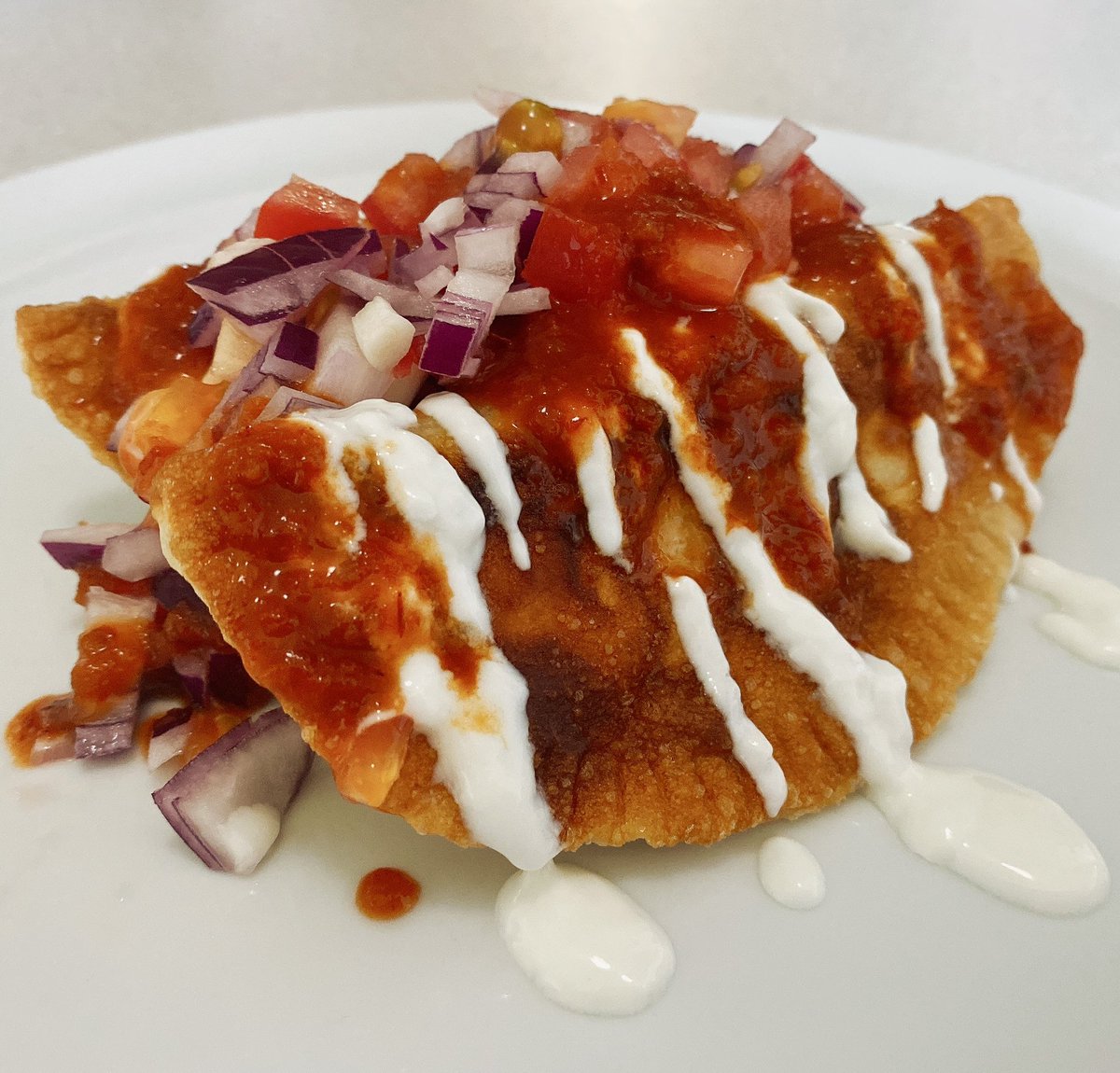 Dinner for one!

How to turn 2 cups of leftovers (lamb curry, rice) into EIGHT meals: spoon into dough, form pockets, pan fry &amp; top w yogurt (or sour cream), raw veggies &amp; loads of ghost pepper hot sauce.  

I get bored eating the same thing but won’t waste food, so I upcycle!