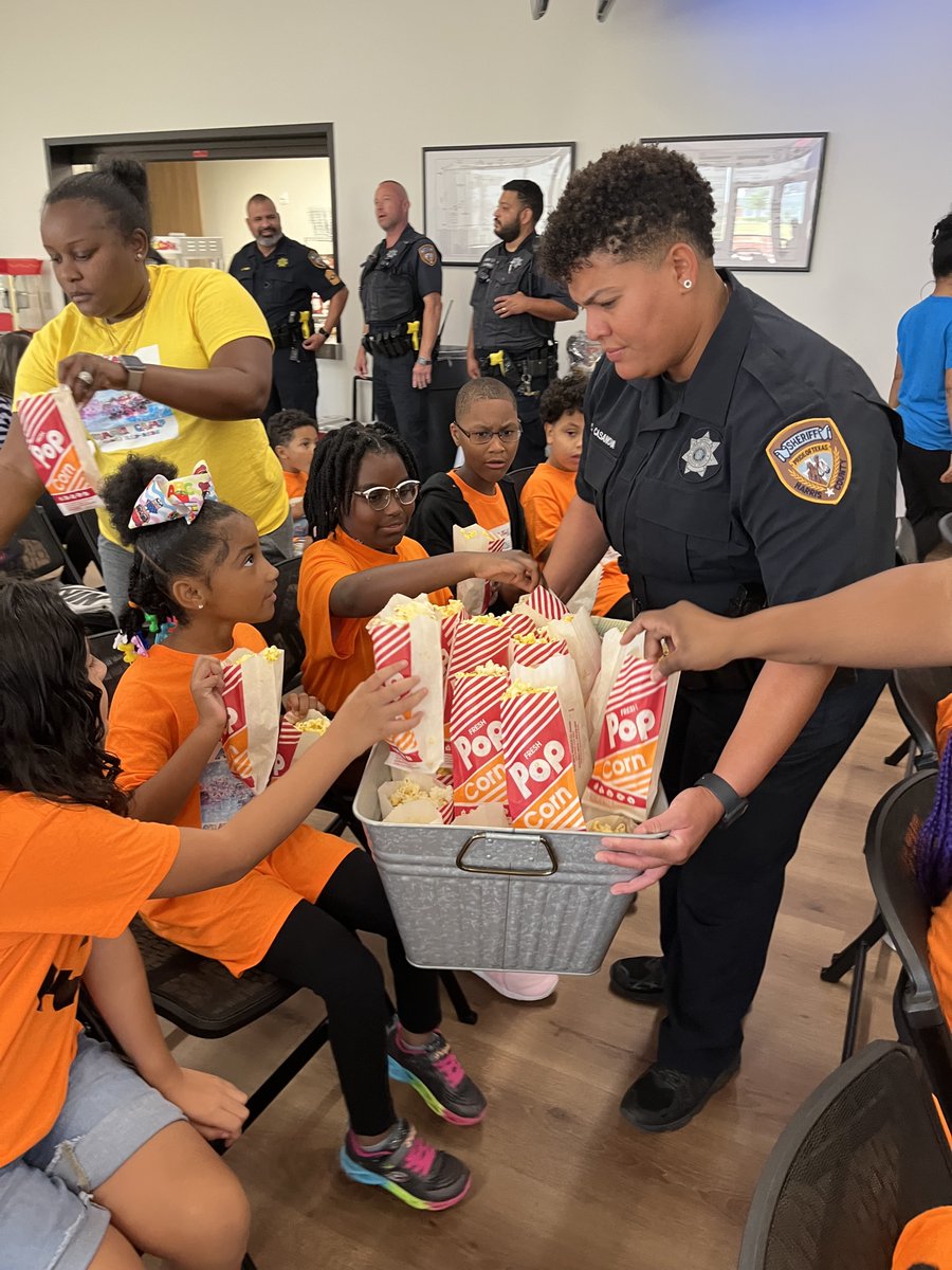 AldineDistrict's tweet photo. We had some super special visitors at the East Aldine Management District today! Young guests from Stay &amp; Play Daycare Center and Academic Academy enjoyed "Movie with A Cop" w/ @HCSOTexas Community Engagement Division. McGruff the Crime Dog stopped by to visit, too! https://t.co/Rx6saNHsLN