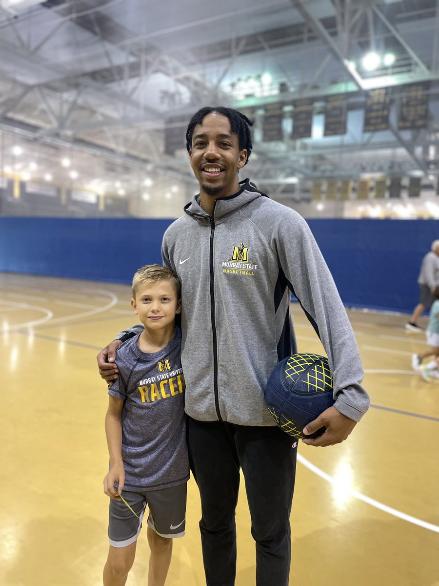 StevenBauer8's tweet photo. A huge thanks to @jacobiwood_  for being such a great mentor for Jasper this week! He looks forward to coming every day because of you! What an awesome impact. Thank you and thank you @CoachProhm and @RacersHoops for such a great camp! #murraystate #murraystateracers https://t.co/WSlVsPQAGT