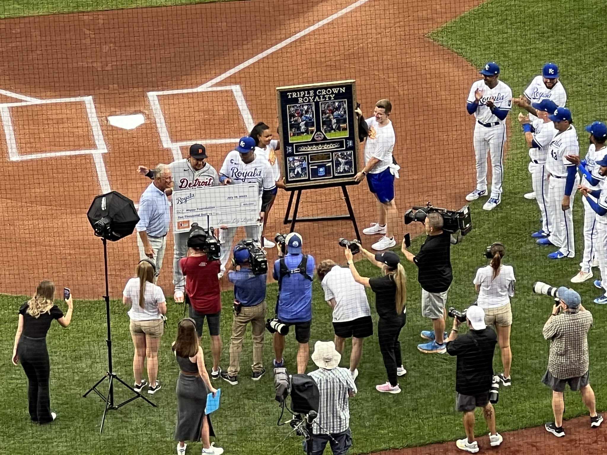 Jason Beck on X: Miguel Cabrera received a framed photo collection of his Triple  Crown clinch in KC as a retirement gift from the Royals, along with a check  for his foundation.