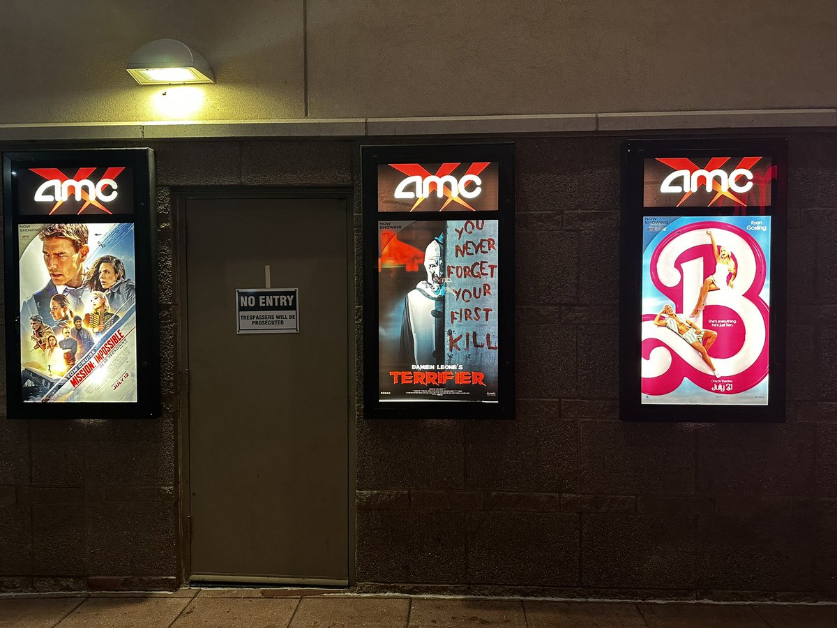 NonDiegeticYT's tweet photo. The most unlikely row of posters at a movie theater.  #MissionImpossible7 #TERRIFIER #Barbie https://t.co/EcJG1QcZvf