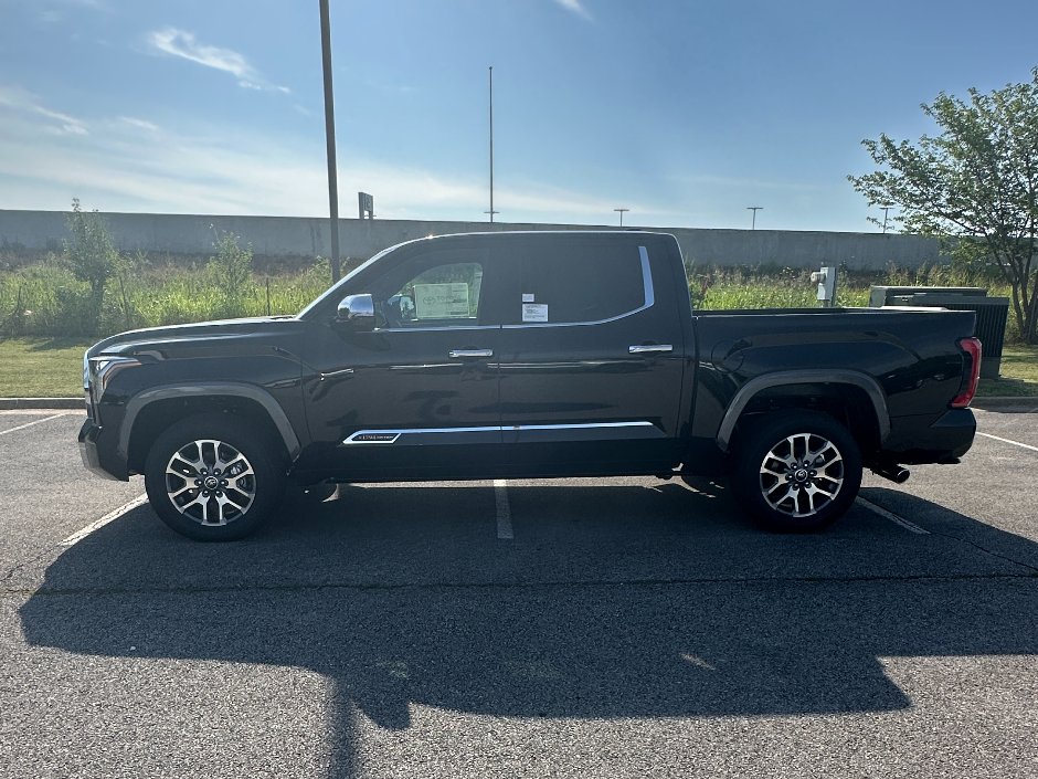 ToyotaNWA's tweet photo. This mighty Midnight Black Metallic Toyota Tundra has your name written all over it. Come get your keys! 😎 🔑 
https://t.co/XpJ57UkhsS https://t.co/T0Mti3Po1Q