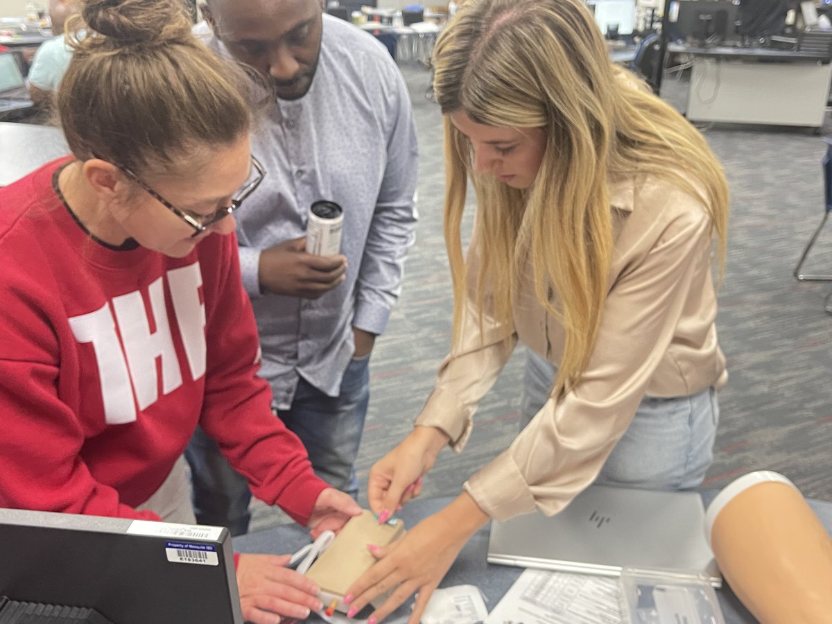 CrandallMiddle's tweet photo. CMS teachers are working hard learning about our new career labs. They took apart a lawn mower engine, wired a light fixture, stitched a wound, drew blood in a veterinary lab, built a rocket out of paper and tape, and programmed and flew a drone! Our kids are going to love this! https://t.co/FUeRvLApmi