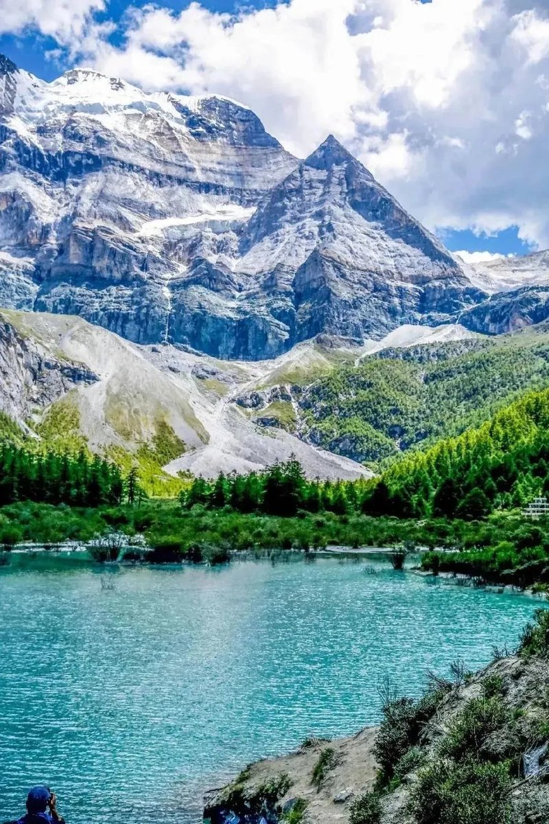LoveYiwu's tweet photo. One of the earliest international mentions of this paradise was by American explorer Joseph F. Rock, who presented the stunning beauty of #Yading in the National Geographic magazine in 1931. https://t.co/Ji0ScIubeK