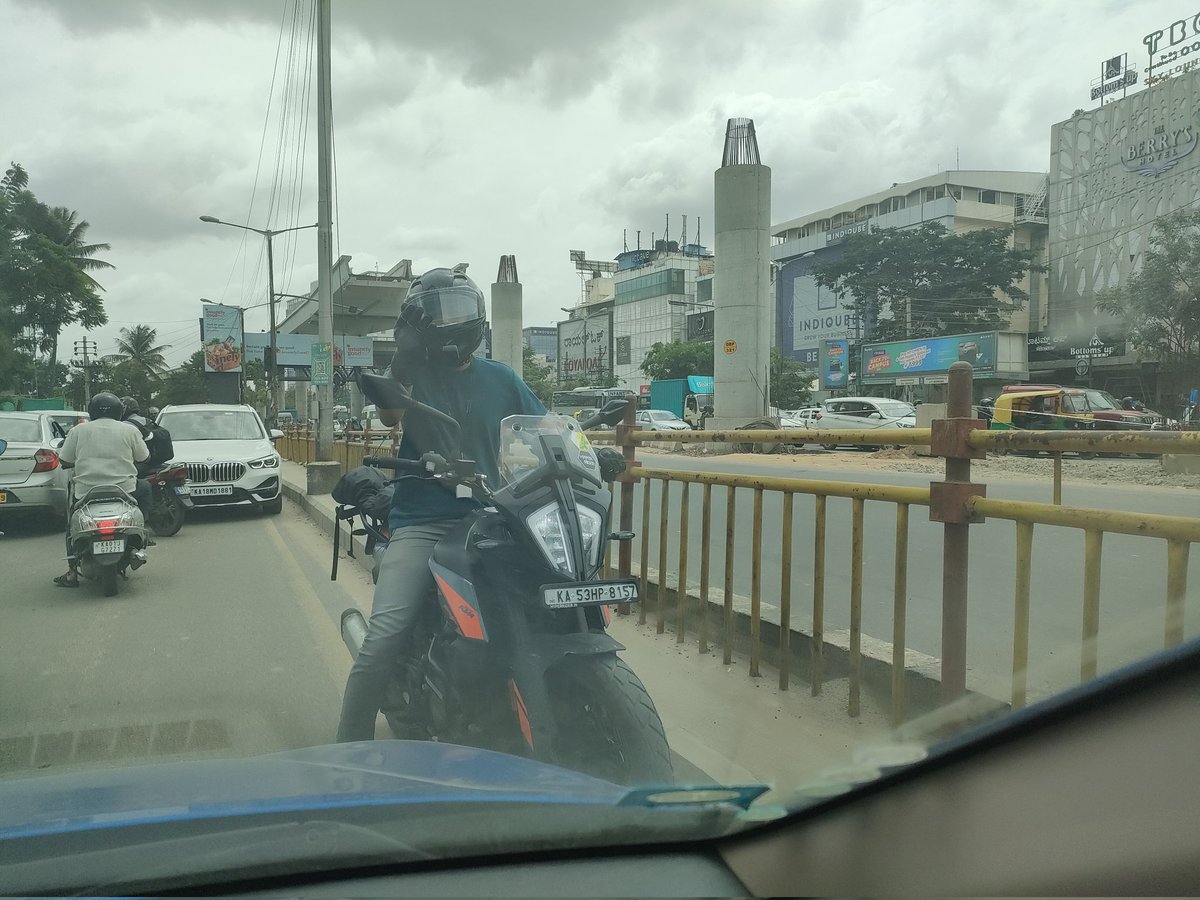 tamhankarp's tweet photo. @btppubliceye  One way rule violations causing traffic have started on the road from Prestige Tech Park to Kadubeesanhalli junction service road. 
Location: Service Road connecting Prestige Tech Park to Kadubeesanhalli junction
Time: 11:50 a.m.
Reg. no. : KA53HP8157 https://t.co/BCuECvEpME