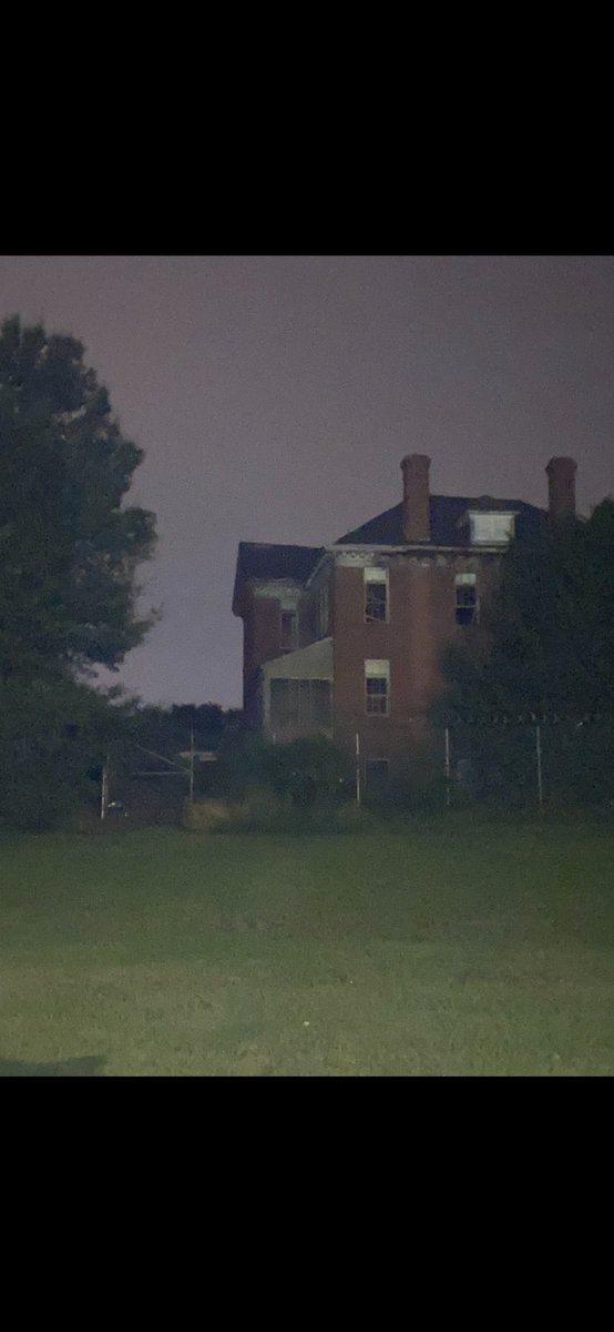 realkennedync's tweet photo. Does anyone else see the apparition of a child in the top left window? (Took this on an iPhone at Stonewall Jackson, NC. Also I know it’s not pixels because u can obv see the shape of the figure) #ghosts #apparition #haunted https://t.co/cRkaR5FvxD