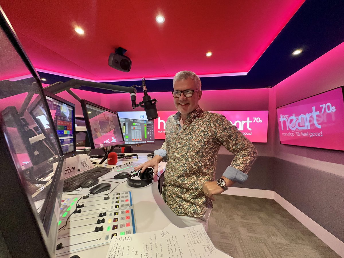 Plenty of laughs here @heart70s … from members of the team who really don’t appreciate my retro shirt collection - from which this is getting its first outing! Songs brighter & louder than my attire to right now with us on DAB📻 smart speaker “play Heart 70s’ & @GlobalPlayer