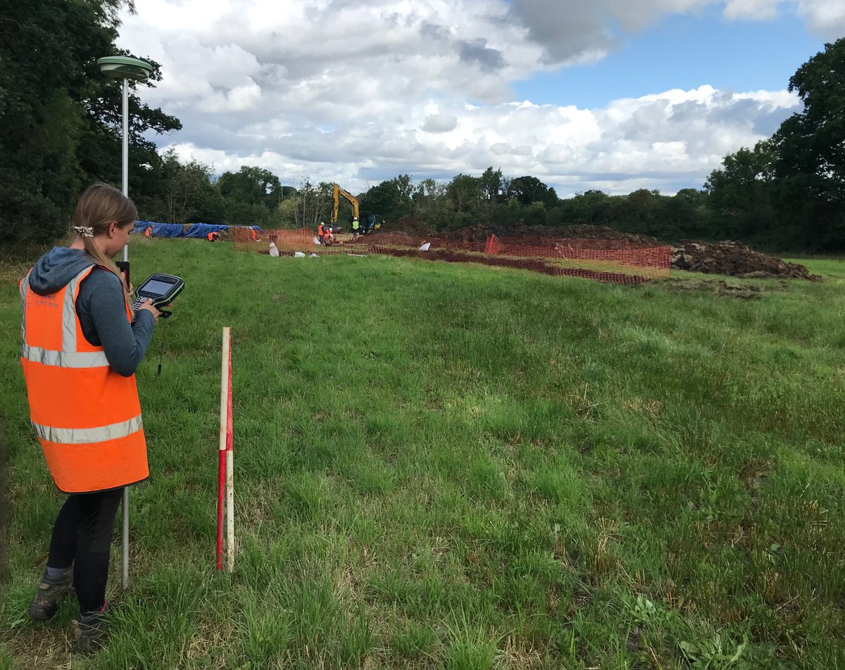 CotswoldArch's tweet photo. Chloe’s GPSing Trench 7, ready for Cliff to cut. We’ve placed this over an anomaly on the #geophys that we’re hoping is a pot kiln. Having said that, there’s a similar feature to the east that we dug last year, and that turned out to be barbed wire… 😬👍 #BrandiersKilnProject https://t.co/alpsjjNNuB