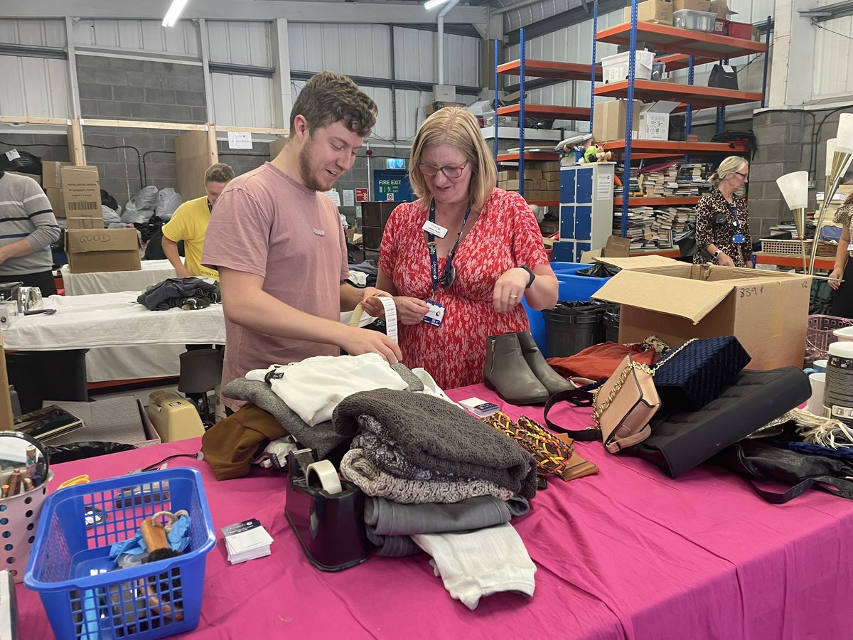 ClaireOvergate's tweet photo. It was amazing to see a lovely team of @OvergateHospice staff and their family members volunteer their time to help sort bags at our Donation Centre last night 💙 https://t.co/tX0YA6C092