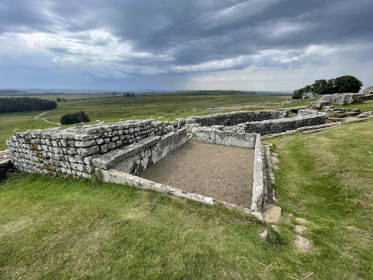 #RomanFortThursday - The communal latrines at Housesteads Roman Fort at #HadriansWall. Built in the low-lying southeast corner of the fort, the latrine was fed by water from various tanks. Wooden seats would have covered the main sewer channel. The smaller channel on the platform