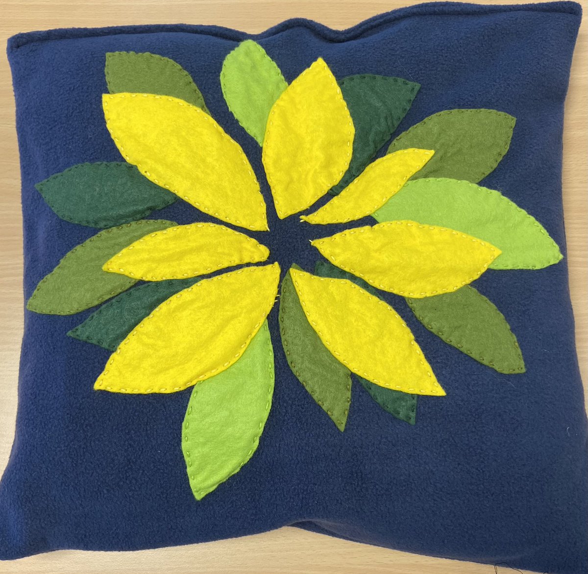 Fabulous cushions designed and created by two of our pupils in sewing club this term.