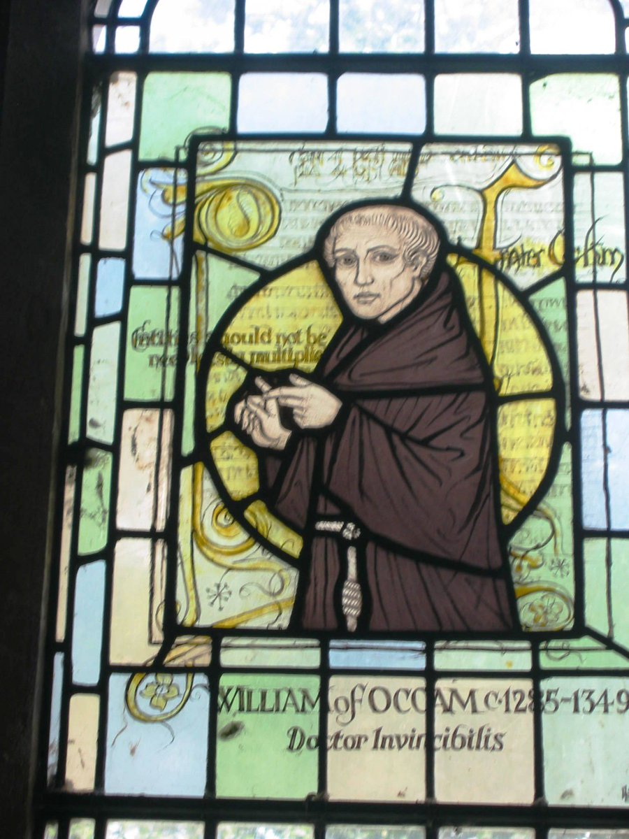 This stained glass window at All Saints', Ockham Church commemorates William of Ockham (1285-1349). An English Franciscan friar, scholastic philosopher, and theologian, he is considered to be one of the major figures of medieval thought. #stainedglasssummer <a href="/cofeguildford/">Diocese of Guildford</a>