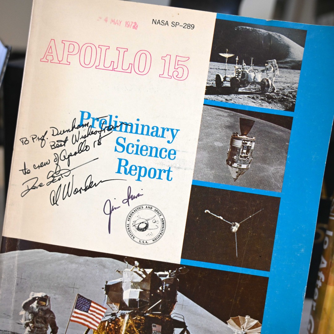 BritGeoSurvey's tweet photo. Today is #InternationalMoonDay! In celebration, staff at our Keyworth library have made a display which features an Apollo 15 Preliminary Science Report, signed by astronauts Dave Scott, Al Worden and Jim Irwin! https://t.co/wqTAxePXFt