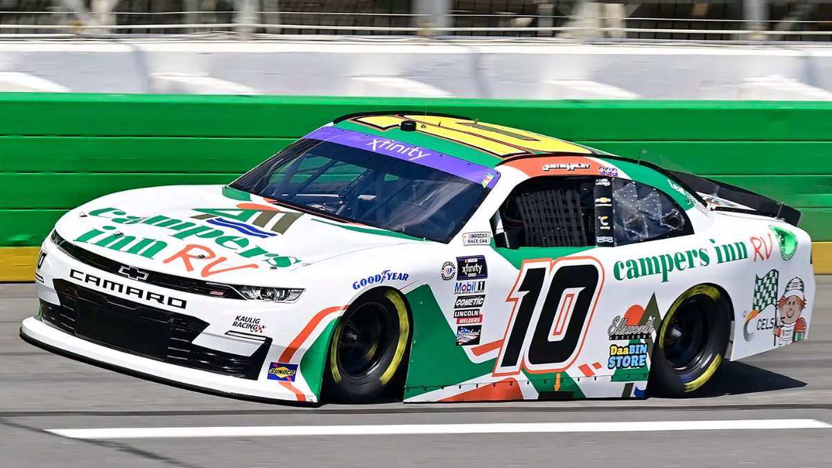 ATLANTA, GA - JULY 09: Kevin Harvick (#4 Stewart Haas Racing Hunt Brothers  Pizza Ford) and Ross Chastain (#1 Trackhouse Racing Worldwide Express  Chevrolet) race side by side the NASCAR Cup Series