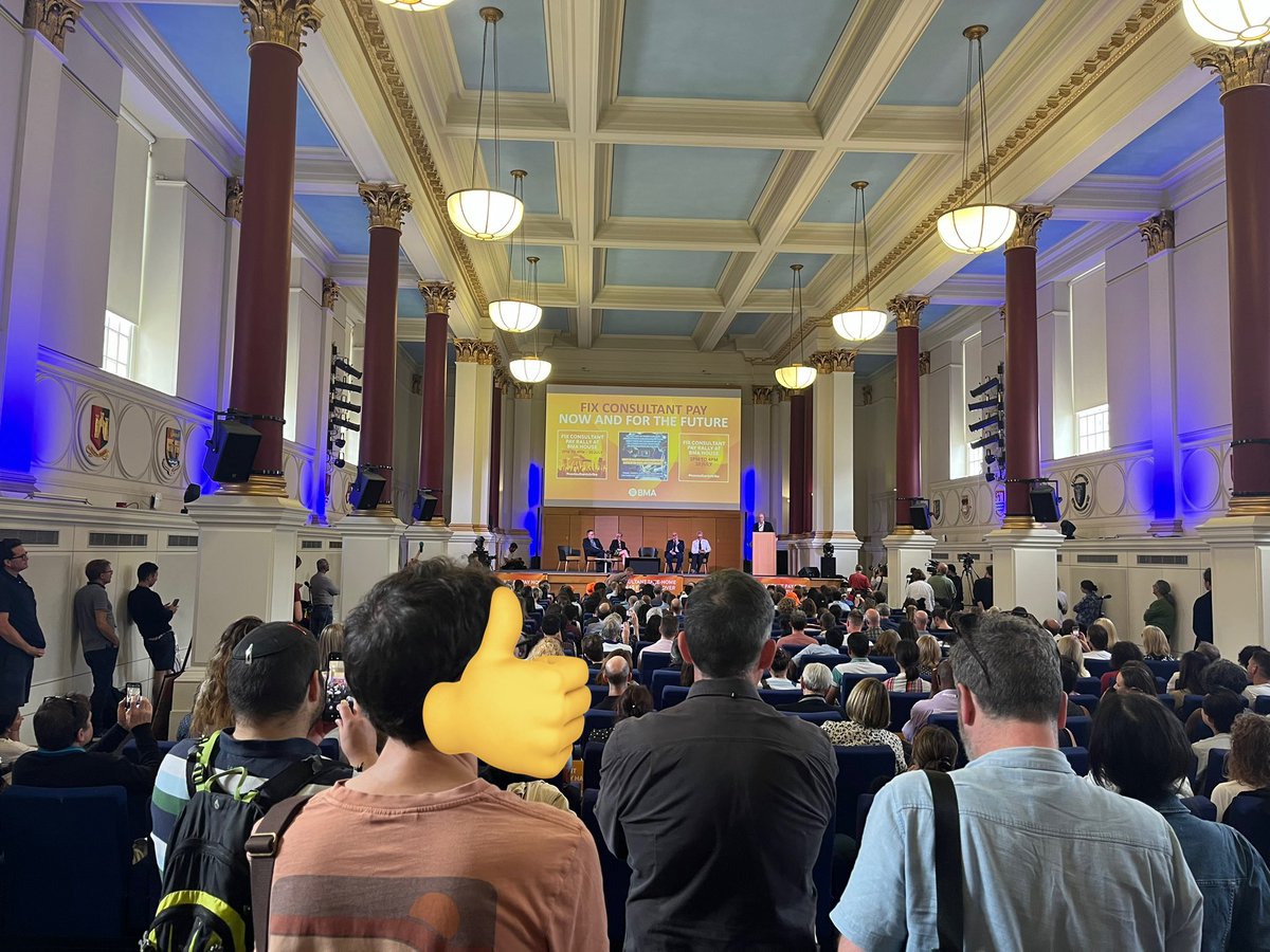 thomasdolphin's tweet photo. Standing room only here at @TheBMA to hear @Vish_Sharm and @RMTunion’s Mick Lynch speak about consultant pay and how we can and will win this fight. Mick making a great case for improved pay and conditions across society. Solidarity! https://t.co/IFRIG0Gshk