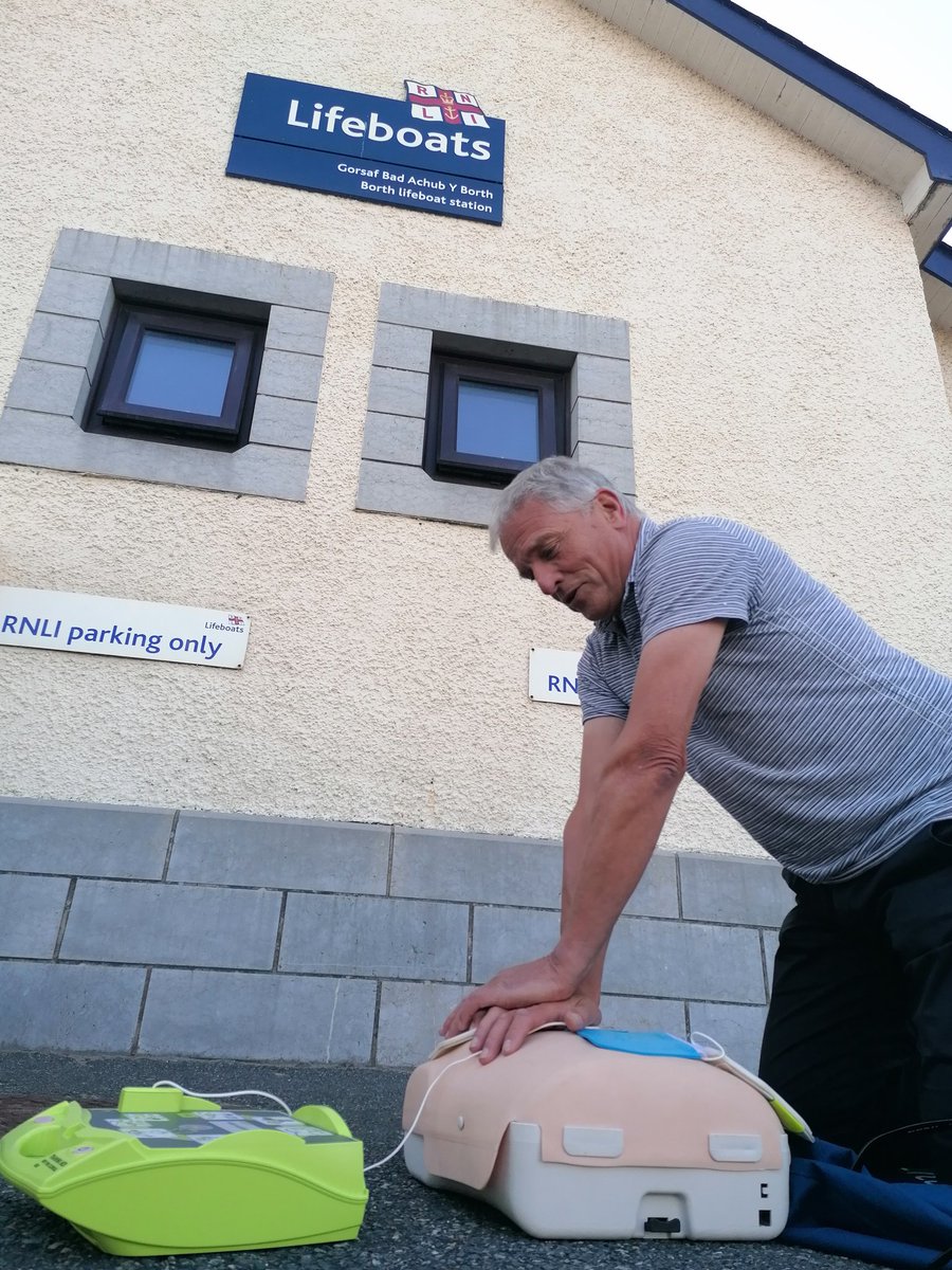 Great to deliver another @savealifecymru defib and offer familiarisation training, this time at Borth RLNI Station. Funding for the cabinet came from a special calendar 📆📸 meet "Mr September" 😳 demonstrating CPR. I believe more calenders are available at the local shop 👍