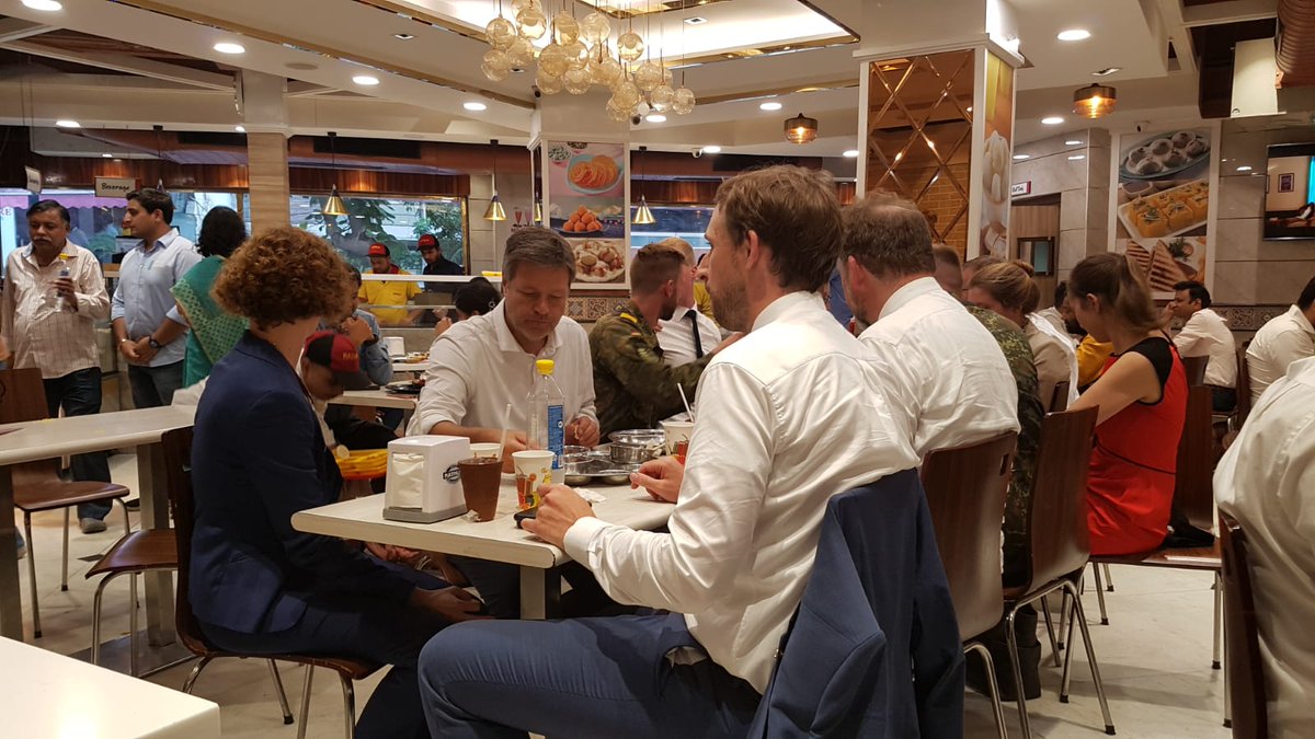 GermanyinIndia's tweet photo. Got a taste of #IncredibleIndia in #saadiDilli!
At legendary Nathu Sweets on Bengali Market Minister #Habeck dug into one of the capital's favourite street foods, chhole bhatoore. https://t.co/TFQeD2mKEL