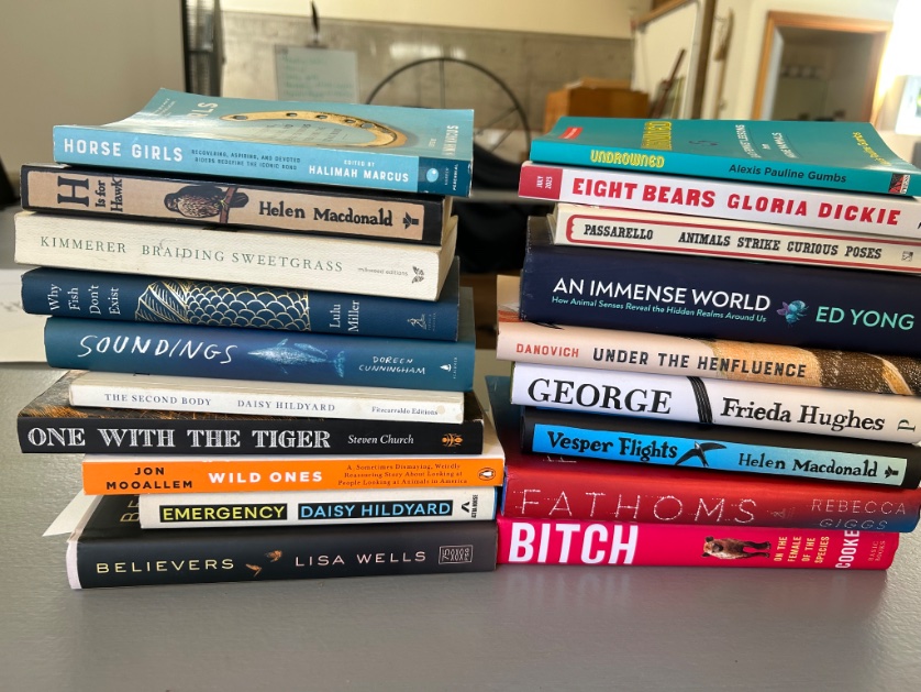 ericajberry's tweet photo. Taught a workshop ft. writing about animals both real + imagined so here’s part of the two-milk-crates-full library I toted and quoted from (not pictured: @aimeenez, @TaliaKolluri, @cmaum, @susanorlean, @aznfusion, @eb_bartels, Emma Marris, Henry Hoke, Ross Gay, Barry Lopez) https://t.co/aJcBPbO5Xx