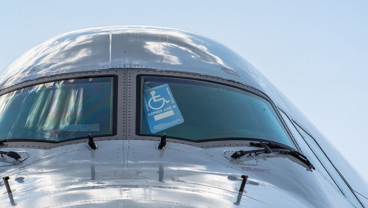 TheBabylonBee's tweet photo. Air Force One Now Equipped With Handicap Parking Pass https://t.co/OyqKt2cqlO https://t.co/JjaEDWl5gl