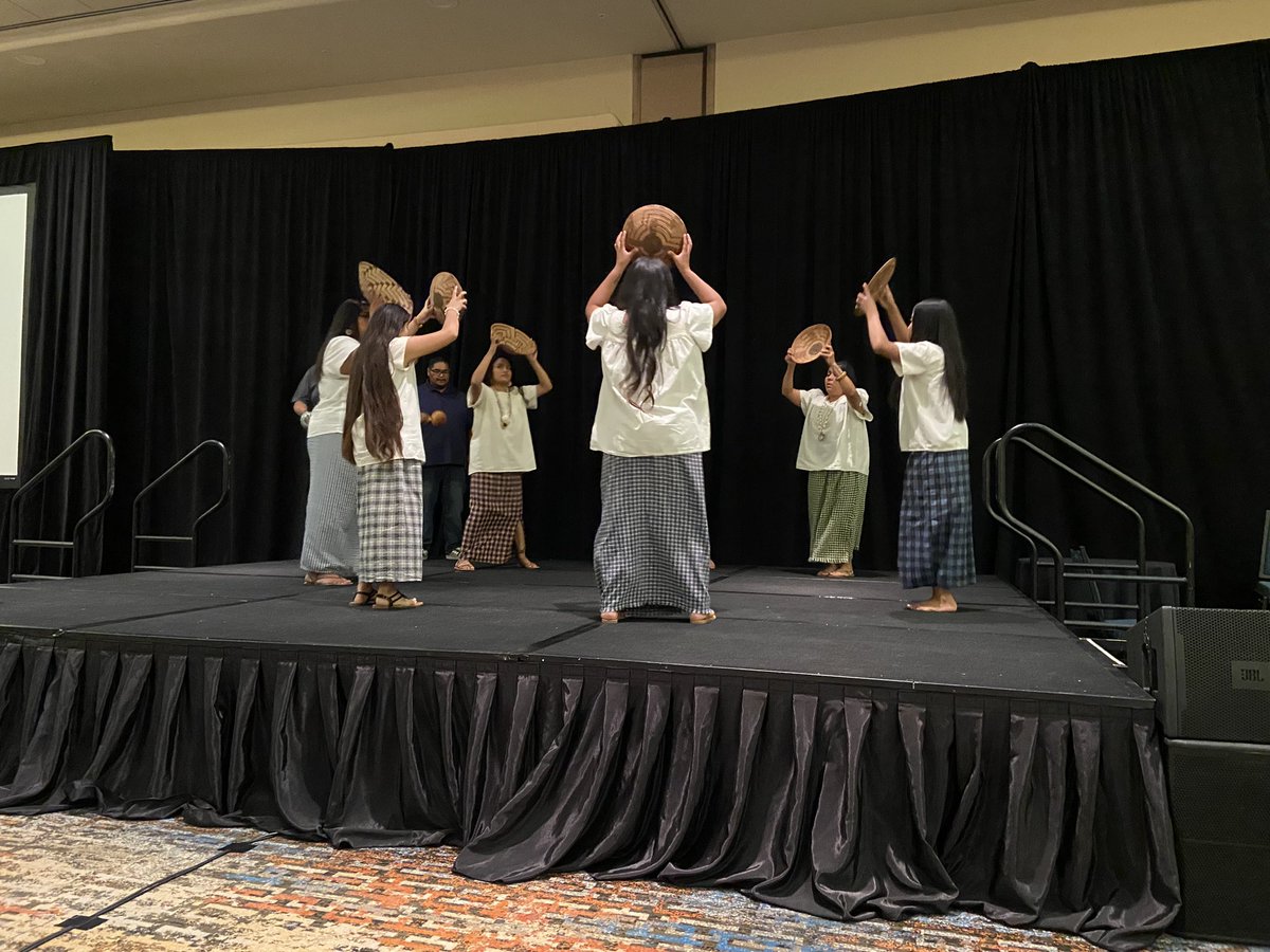 We finished our GRIC experience with a traditional craft and lunch. It took me over two hours to weave my little basket. One of theirs that measures about 6” is valued at $500.  Mine is just yarn. During lunch, basket dancers. #DKGcon2023 #va_dkg #keywomeneducators #dkg_va