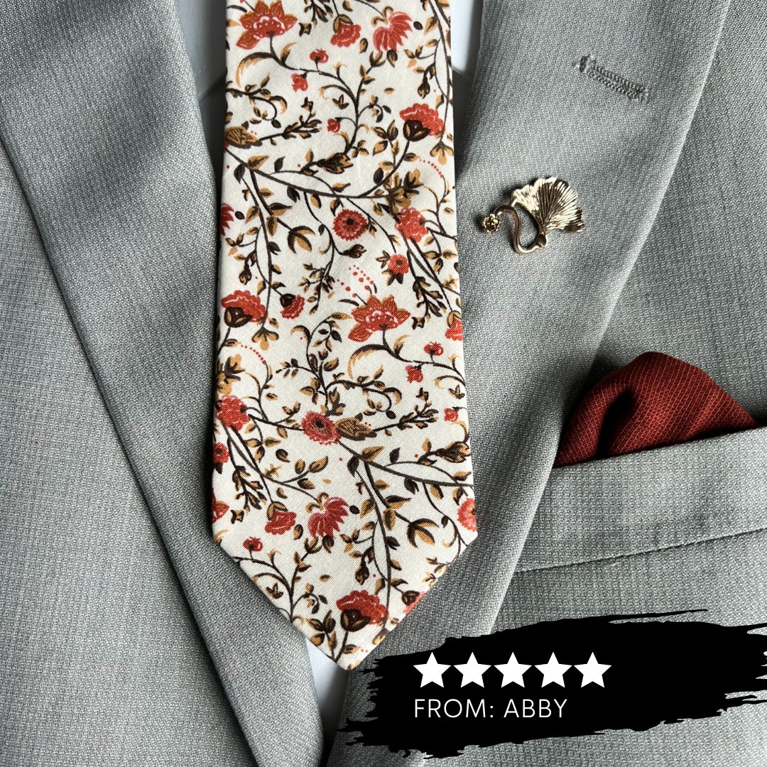 Spice up your wardrobe with our captivating Cinnamon Floral Tie! #2023wedding #2023weddings #ties #tie #neckties #pocketsquare #fallwedding #rusticwedding #weddingtie #groomsmen #menswear #mensfashion  #mensties #floraltie #floralties #tiesets #customerreview #customerreviews