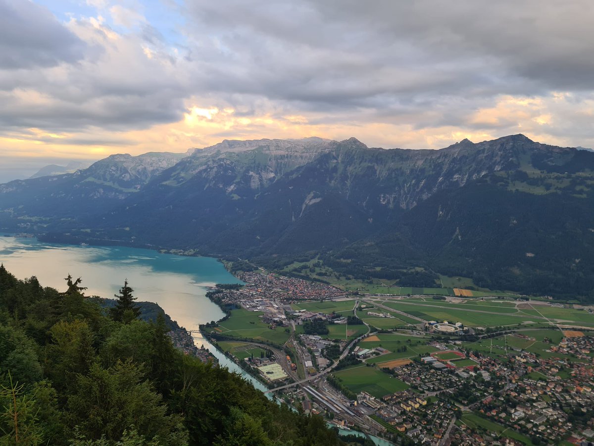 Interrailing Europe | Bern 🇨🇭 | Day 10 Best day of the journey so far with a trip to Interlaken on our travels into Switzerland. The bluest of lakes, paragliders in the sky, completely surrounded by mountains and a meal with a view from HarderKlum. An incredibly special place 😍