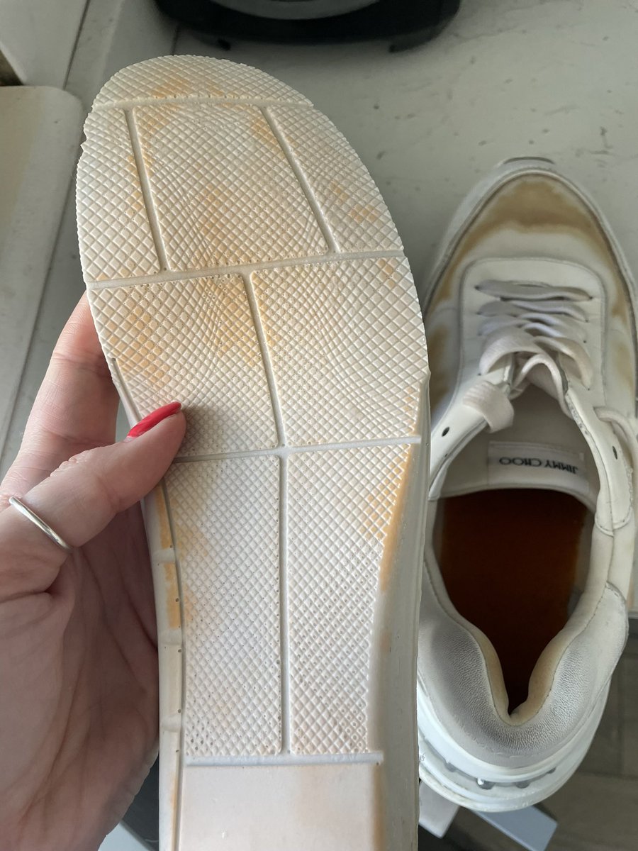 sibby1702's tweet photo. @jimmychoo drenched feet thanks to #greatbritishsummer ☔️ and my white #jimmychootrainers have dried like this thanks to the orange inner lining 🤦🏼‍♀️ and the marks won’t come out. Help! #jimmychoo #ruined https://t.co/msOS3jDKOn