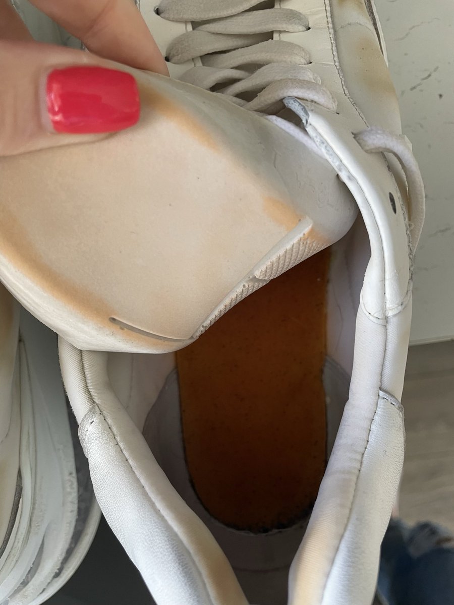 sibby1702's tweet photo. @jimmychoo drenched feet thanks to #greatbritishsummer ☔️ and my white #jimmychootrainers have dried like this thanks to the orange inner lining 🤦🏼‍♀️ and the marks won’t come out. Help! #jimmychoo #ruined https://t.co/msOS3jDKOn