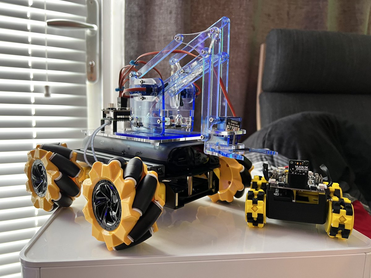 I got the mecanum wheeled version. It’s rather epic @orionrobots <a href="/ThePiHut/">The Pi Hut</a>, featured here with a <a href="/MeArmTM/">MeArmTM 🤖🤖🤖 headed to Bluesky</a> on top. Just need to add the <a href="/Raspberry_Pi/">Raspberry Pi</a> 4 and install <a href="/viamrobotics/">Viam</a> app!  SMARS Inventor for scale.