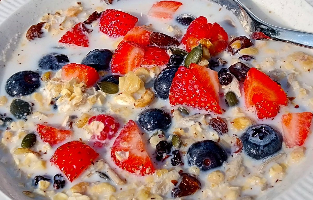 differentkitch's tweet photo. Strawberries, raspberries, blueberries, nuts and seeds on oat muesli making a great start to a summer's day. Eaten al fresco, of course ☀️#food #blogging #foodblog #breakfast #muesli #summereating #vegetarian https://t.co/5FnymYwIXD