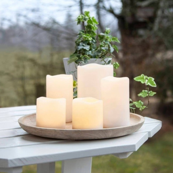 A pack of melted edge look battery operated LED candles that are suitable for indoor or outdoor use, and come with a remote control, and optional 6 hour timer.

bit.ly/3K7eDhO