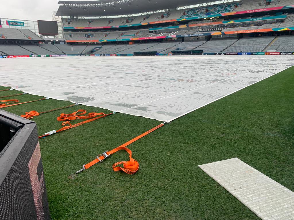 SSStadia's tweet photo. Rather a lot of rain for the @SSStadia guys in Auckland covering the pitch with the MacLeod Cover after the fantastic game yesterday. 
#doingourjob #rain https://t.co/88SBTfV5iS